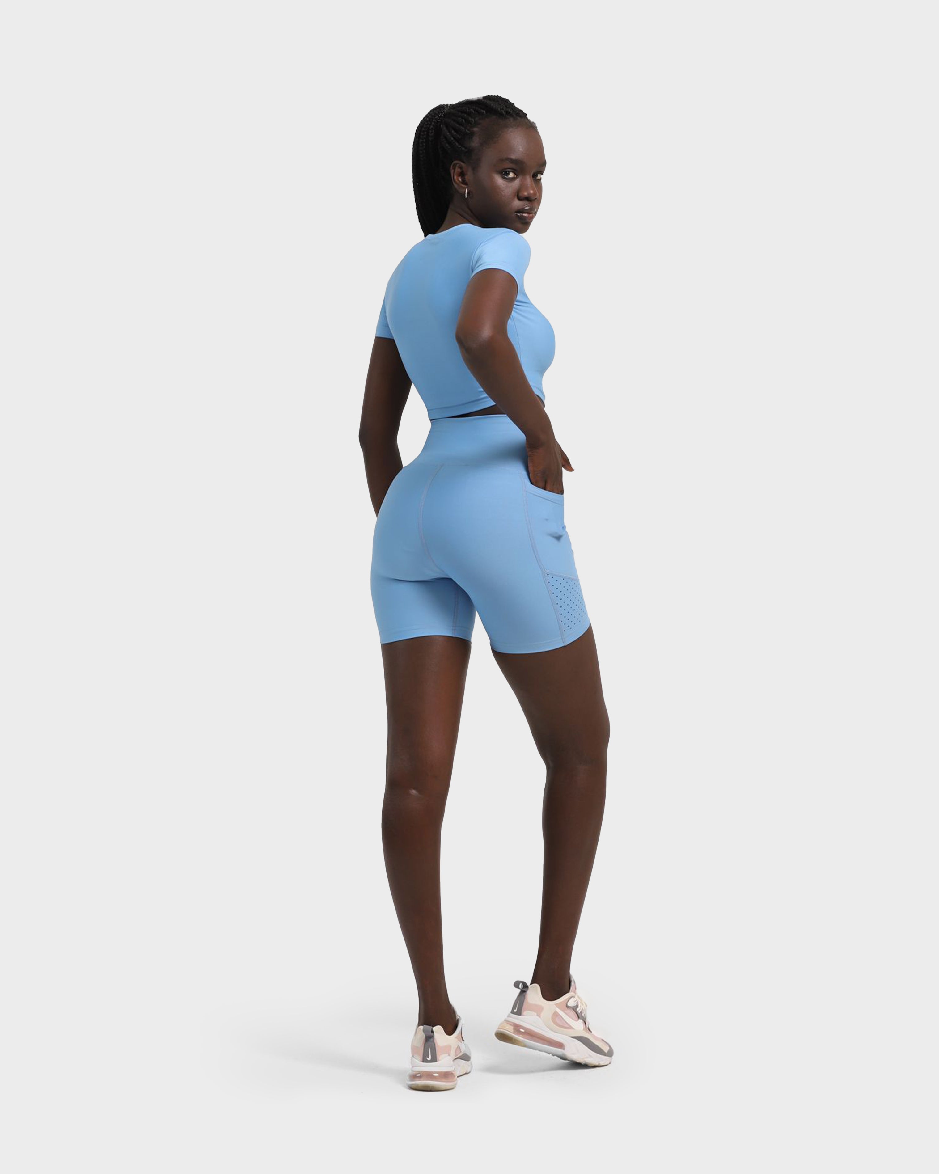 LASER-CUT POCKET SHORT TIGHTS BLUE