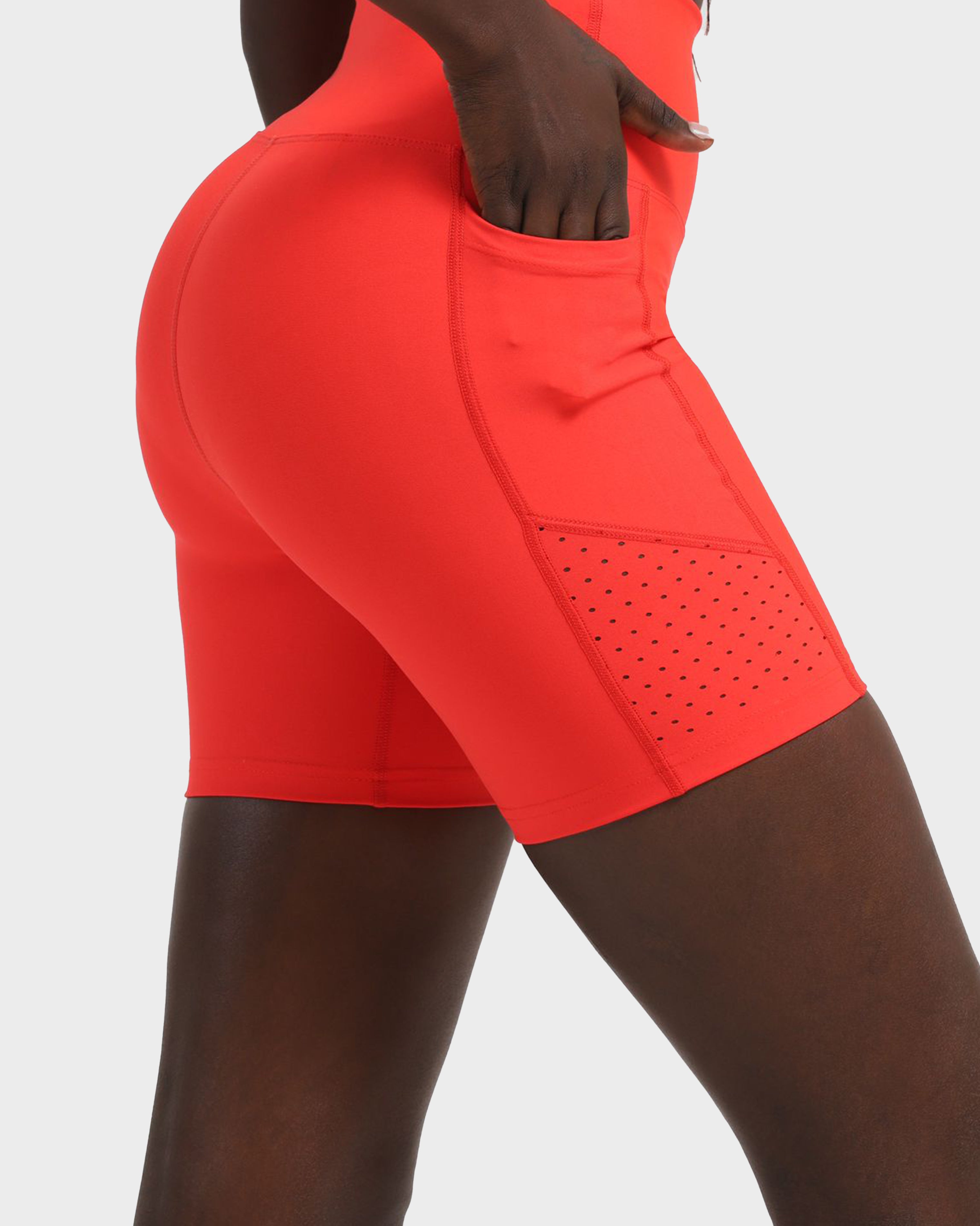 LASER-CUT POCKET SHORT TIGHTS VERMILION