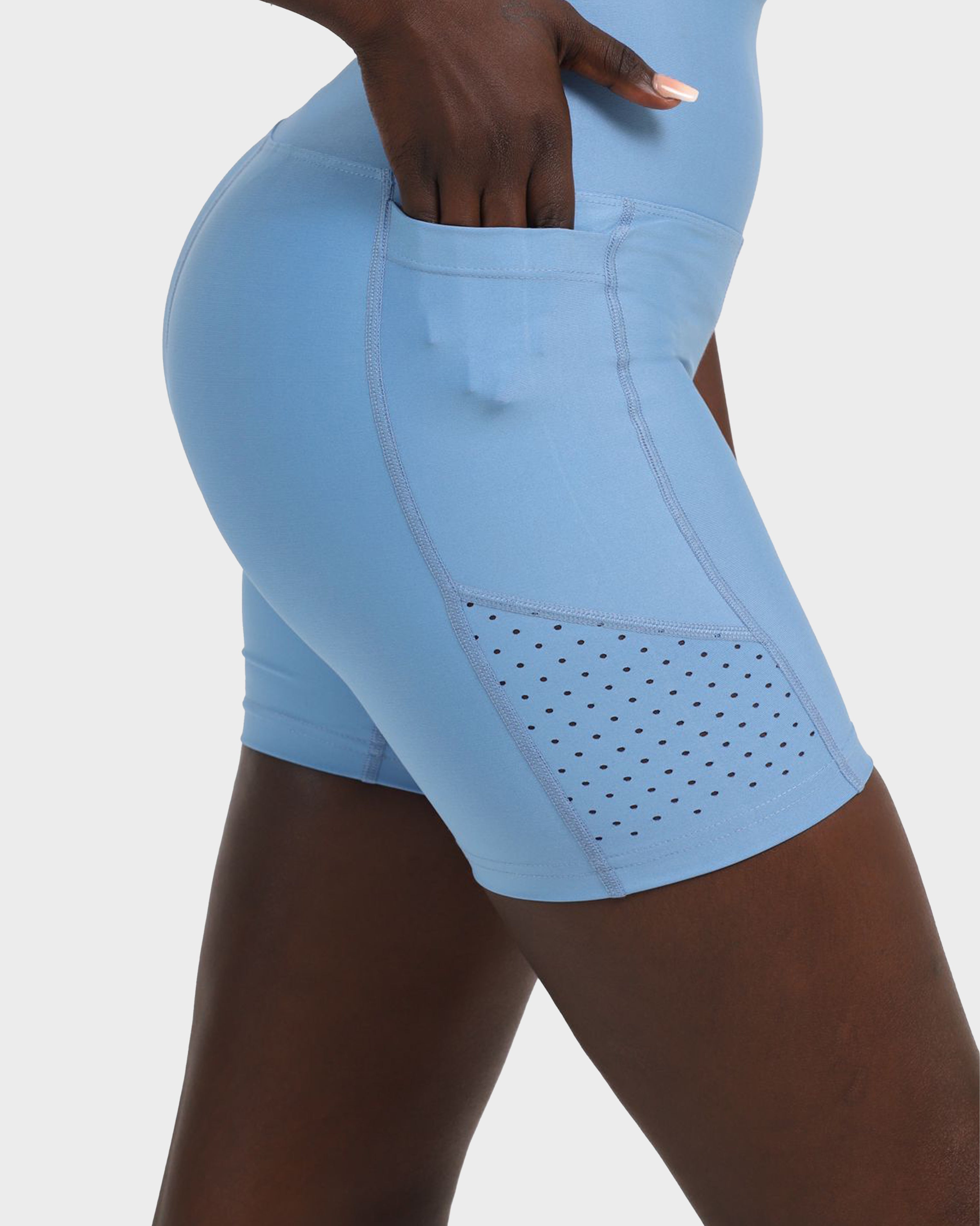 LASER-CUT POCKET SHORT TIGHTS BLUE