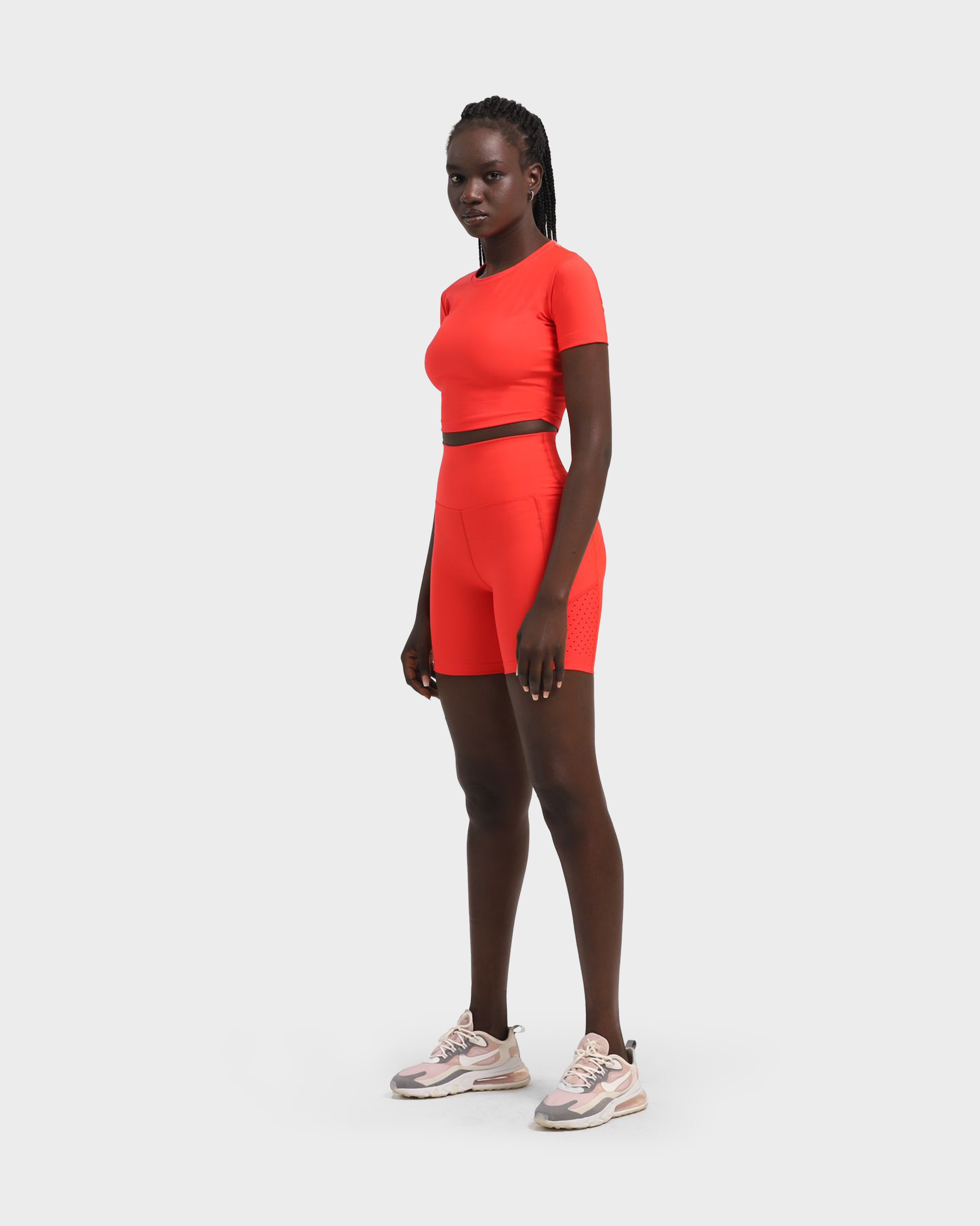 LASER-CUT POCKET SHORT TIGHTS VERMILION